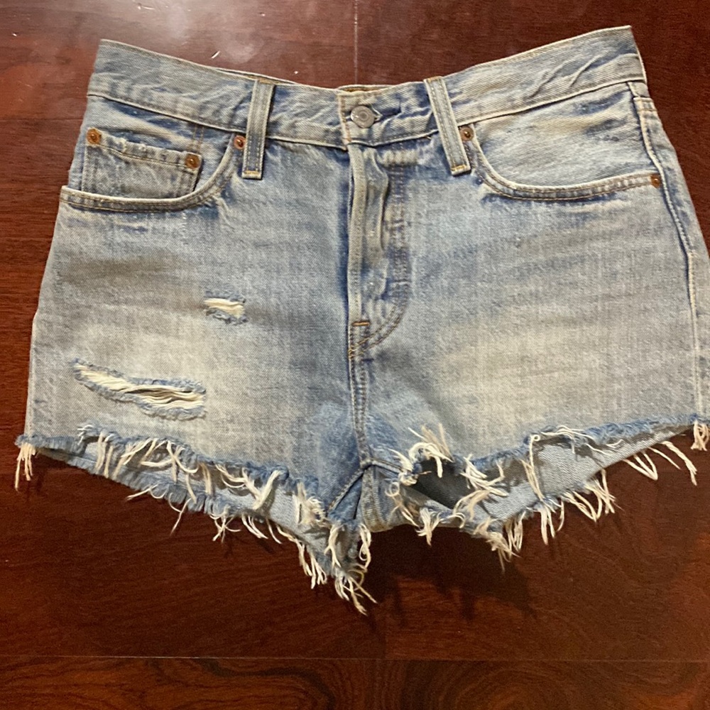 Medium usage, Levi Blue jean shorts. Great amazing for size 27